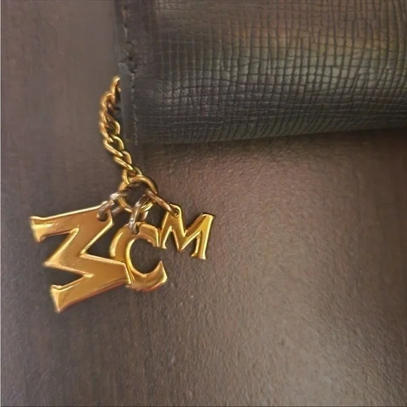 EUC MCM Wallet with charms still attached. Black Leather - Picture 7 of 13